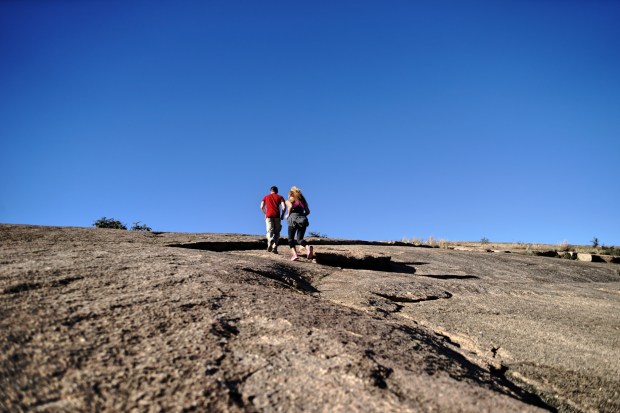 My brother Edwin and wife Jenna run up the rock face like it's no big deal. 