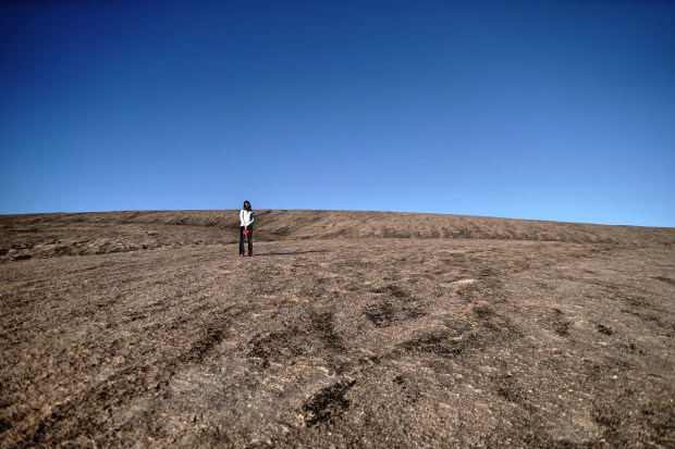 My sister Amanda looks like she's on the surface of Mars (except the sky would be a more hazy-brown color!).